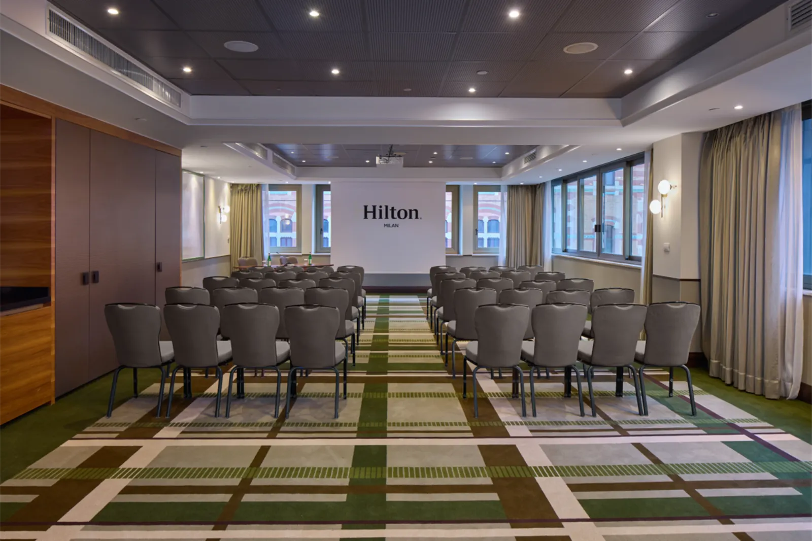 Hilton Milan meeting room set for the summit